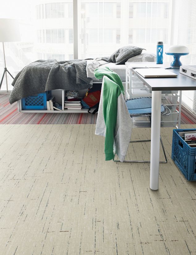 Interface Raw Materials plank LVT and Aglow plank carpet tile in residential living.